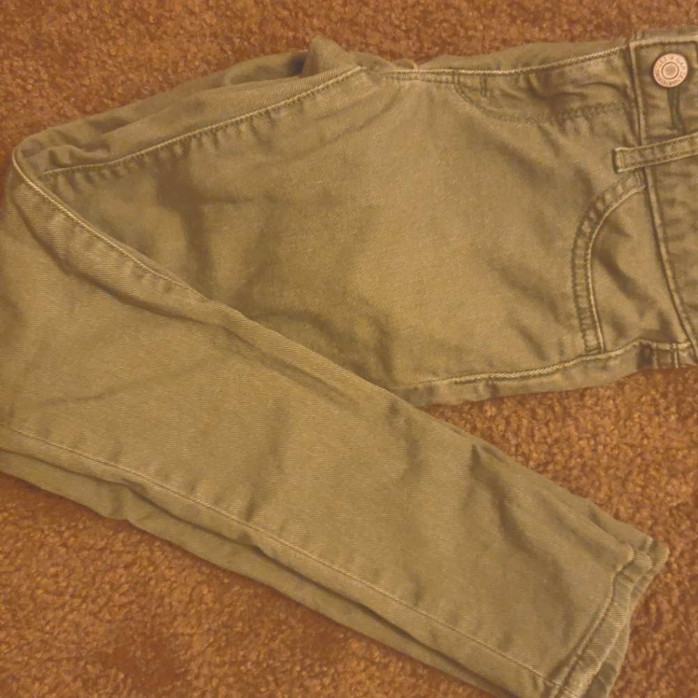 Girls Gap denim olive colored jeans. Never worn.